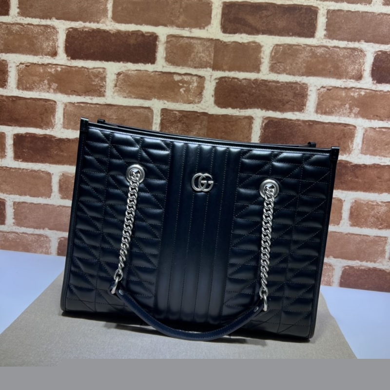 G*u*i top handle bags